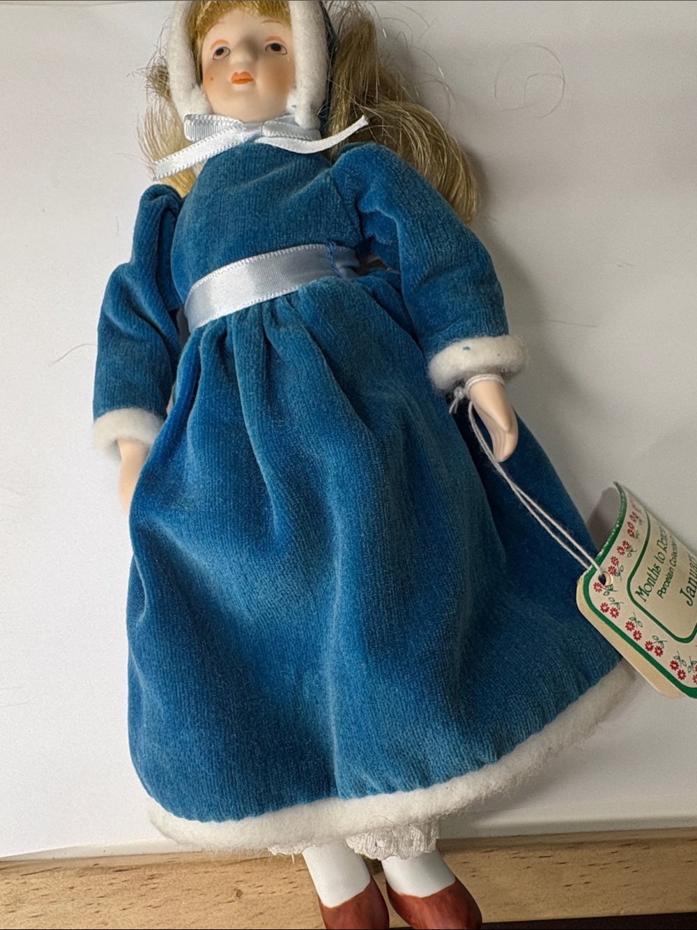 Porcelain Doll in Blue Velvet Dress with White Trim